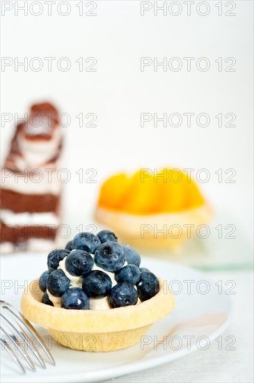 Fresh blueberry cream cupcake homemade closeup macro