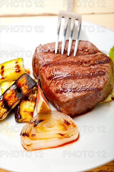 Grilled fresh beef filet mignon and vegetables