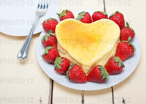 Heart shaped cheesecake with strawberryes ideal cake for valentine day