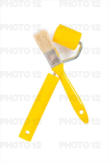 Yellow brush and paint roller