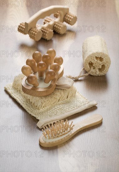 Massager with bath sponge and hairbrush
