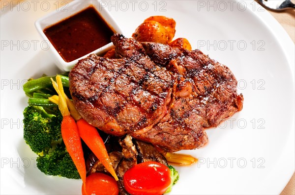 Fresh grilled ribeye steak with broccoli