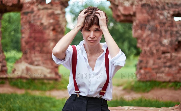 Image of a stylish beautiful woman in a white shirt