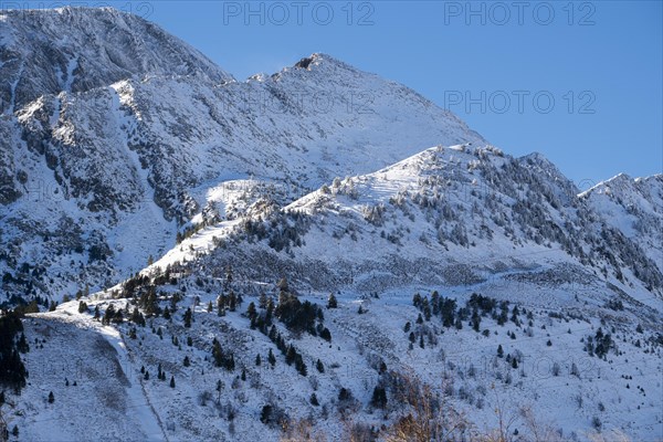 Natural landscape in the autumn with snow-capped mountains in the Cerdanya area in the province of Gerona in Catalonia in Spain