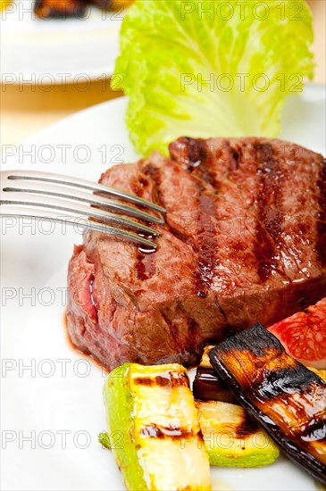 Grilled fresh beef filet mignon and vegetables