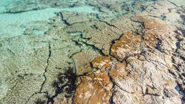 Aerial view from drone of a natural paradise beach in the mediterranean