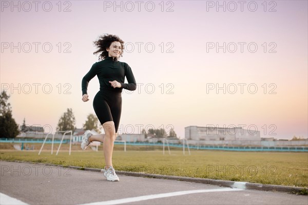 Curly woman runner
