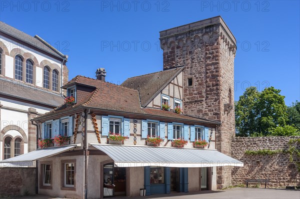 Half-timbered ensemble with historic city wall on Place Andre Neher