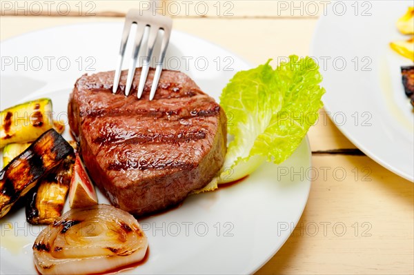 Grilled fresh beef filet mignon and vegetables