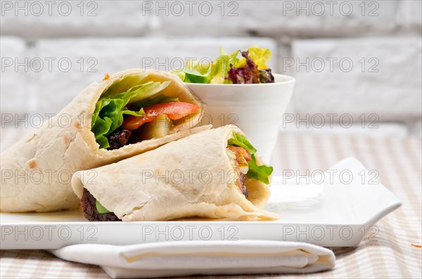 Kafta shawarma chicken pita wrap roll sandwich traditional arab mid east food