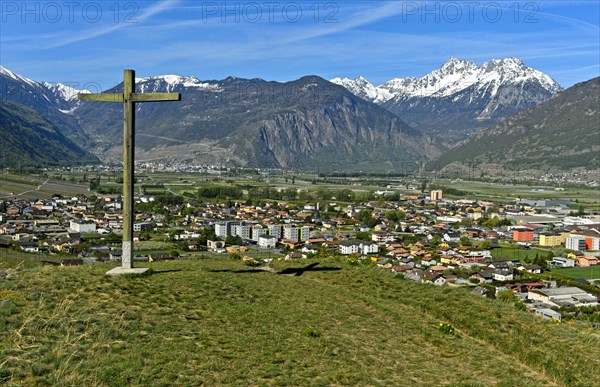 The village of Charrat in the wide Rhone valley in Lower Valais