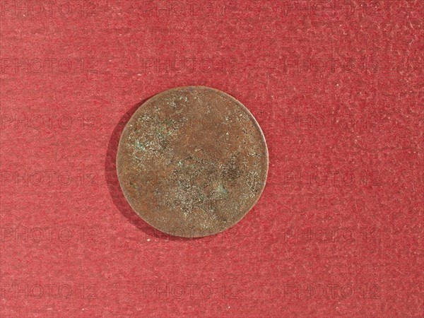 Ancient rusted coin