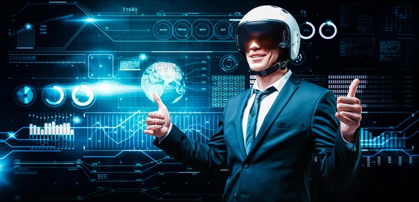 Portrait of a man in a suit and helmet. He is showing thumbs up against the background of a hologram of market trading. Business concept. Stock market. Brokers and traders.