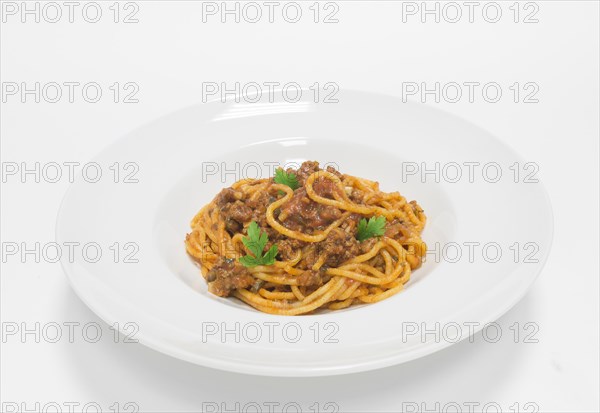 Gourmet pasta with minced meat and tomato sauce. Top view. White background. Healthy eating concept.