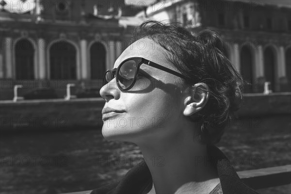 Portrait of a woman in St. Petersburg during a boat trip. Tourism concept