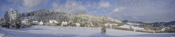 Winter panorama with view to Pankraziburg and church on