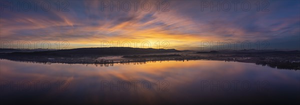 Aerial panorama of an atmospheric sunset over the Untersee