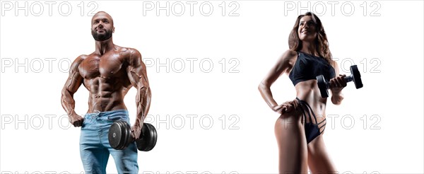 Muscular man and woman posing with dumbbells over white background. Bodybuilding and fitness concept.