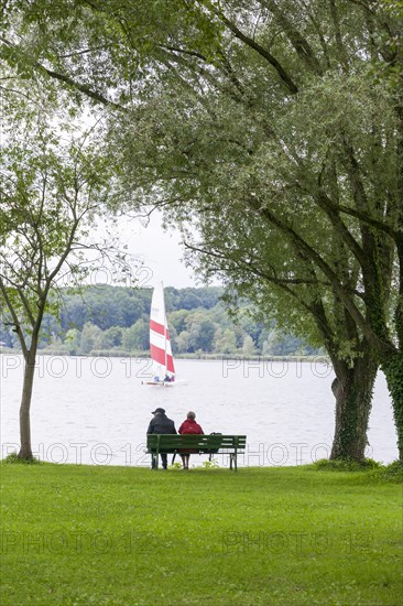 Couple sitting on a bench