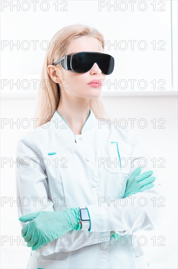 Portrait of a girl in black glasses for laser hair removal. Concept of cosmetology
