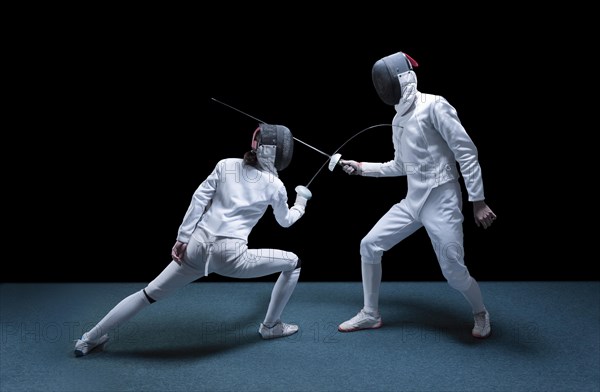 Two fencers are fighting in a tournament. The concept of fencing.