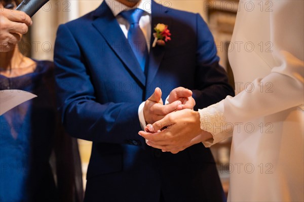 Bride and groom delivering earnest money at a church wedding