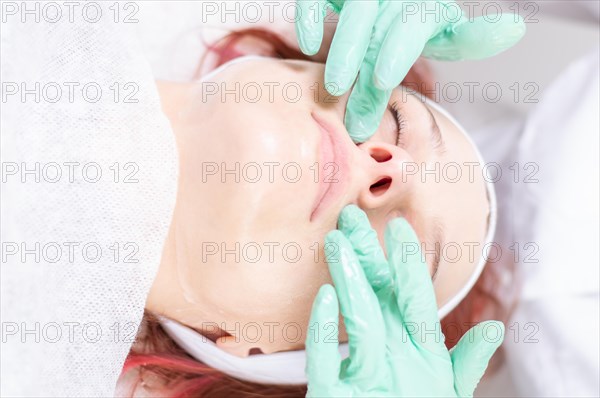 Portrait of a woman's face with problem skin. Peeling procedure. Natural beauty.