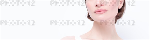 Portrait of a beautiful girl with provocative makeup. White background. Beauty concept. High quality