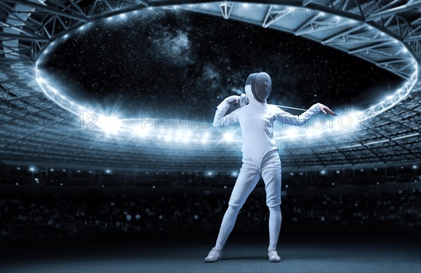 Portrait of a fencer against the backdrop of a sports arena. The concept of fencing.