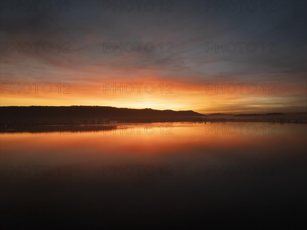 Aerial view of an atmospheric sunset over the Untersee