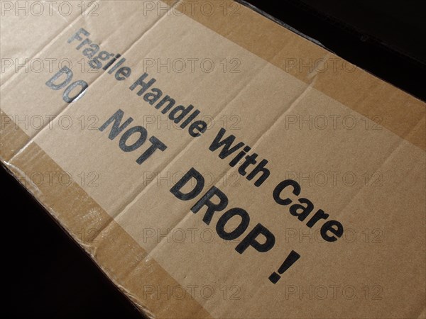 Corrugated cardboard with fragile label