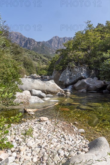 Idyllic water landscape on the Porto river with mountain range in the background