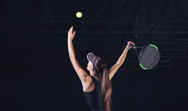 Portrait of a beautiful tennis player during a match. Sports concept.