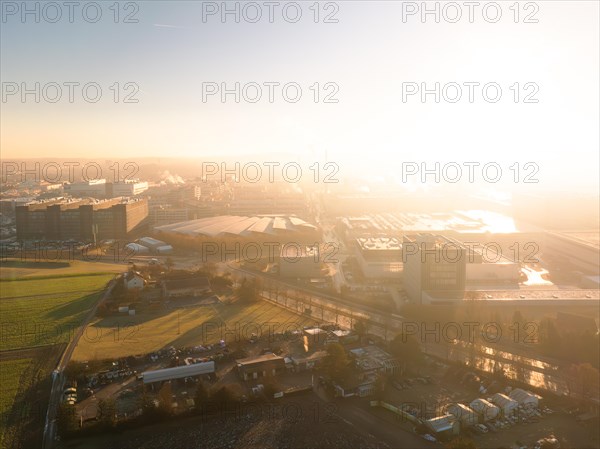 Aerial view The industrial landscape shines in the first sunlight of the day