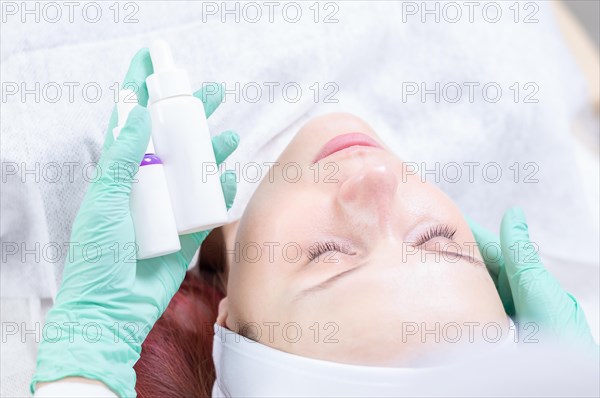 Image of bottles with medicines for facial skin care. Concept for beauty salons.