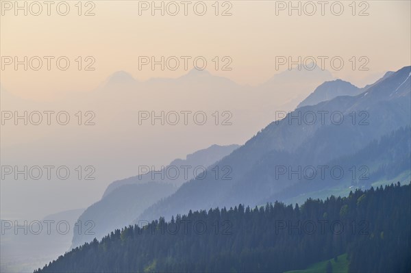 Sunrise over a misty mountain landscape with Eiger