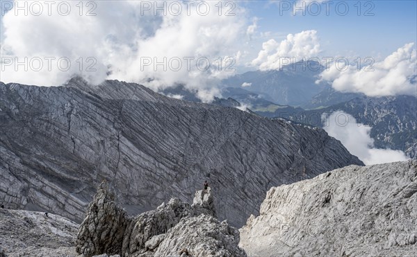 Mountaineer on rocky peak