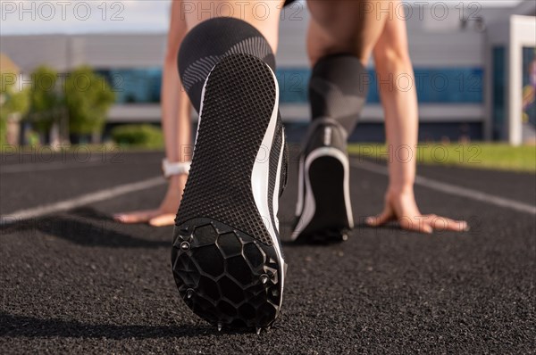 Close-up image of a spiked running shoe. Sports concept.
