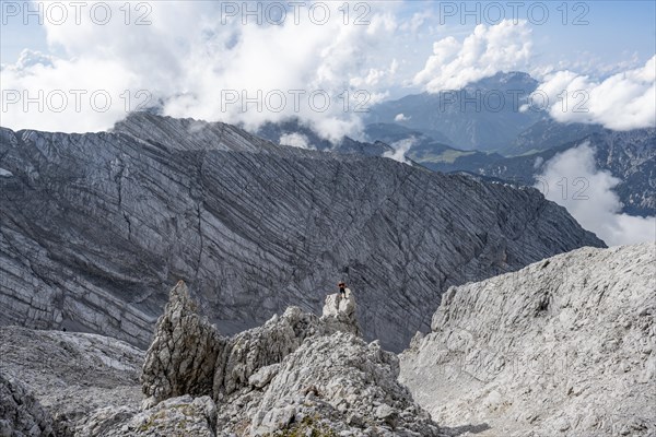 Mountaineer on rocky peak