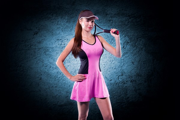 Image of a tennis player with a racket. Sports concept.