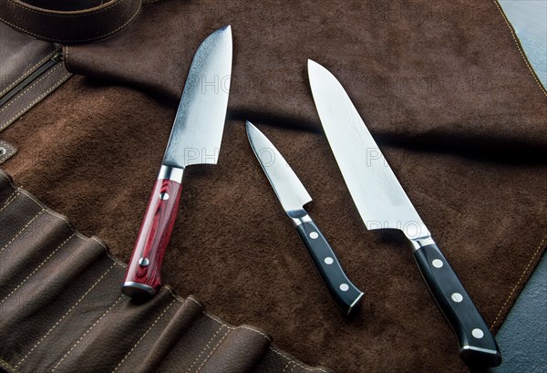 Excellent set of Japanese chef's knives from Damascus steel. View from above