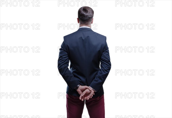 Image of a man in a suit on a white background. Back view. Business concept.