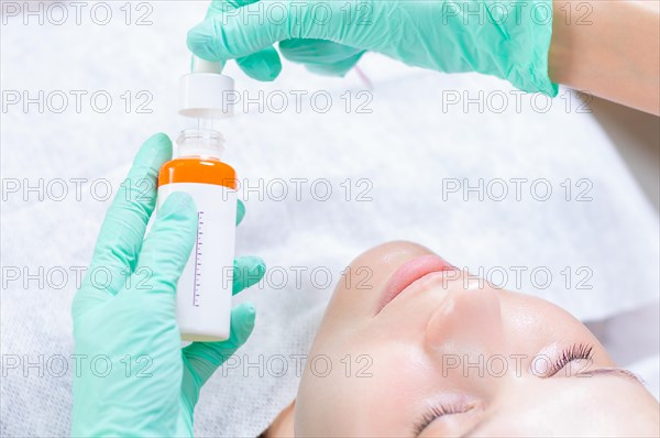 Image of bottles with medicines for facial skin care. Concept for beauty salons.