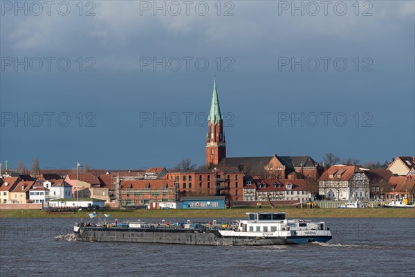 Barge on the Elbe with church in the background