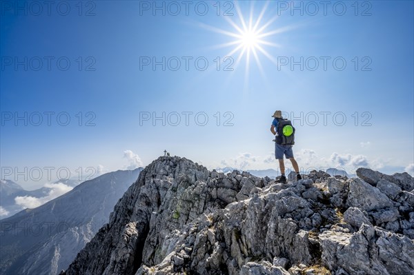 Mountaineer on rocky mountain path