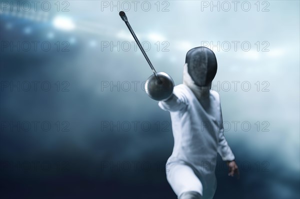 The fencer moves forward with a sword in his hand. Sport concept.