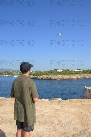 Rear view of teenage boy