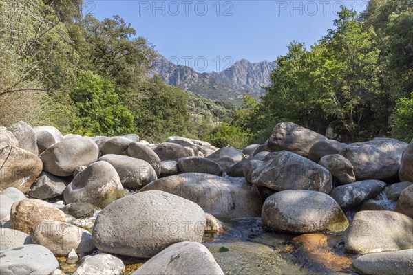 Idyllic water landscape on the Porto river with mountain range in the background