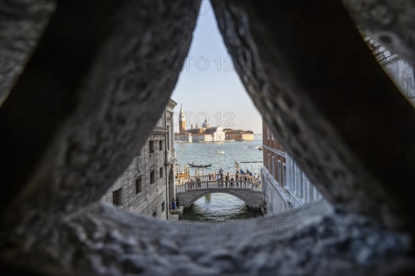 View from the Bridge of Sighs through a small hatch