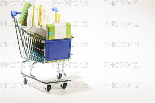 Shopping cart full of food purchased at the supermarket